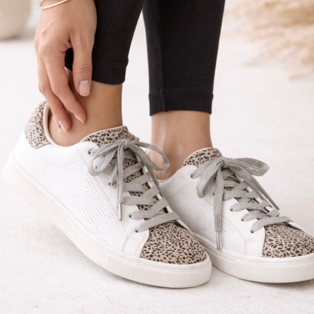 Women’s cheetah print/white lace up tennis shoes. Size 8.5